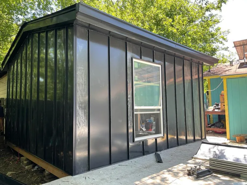 Black standing seam metal wall panels for Roof Inspection in Yuma