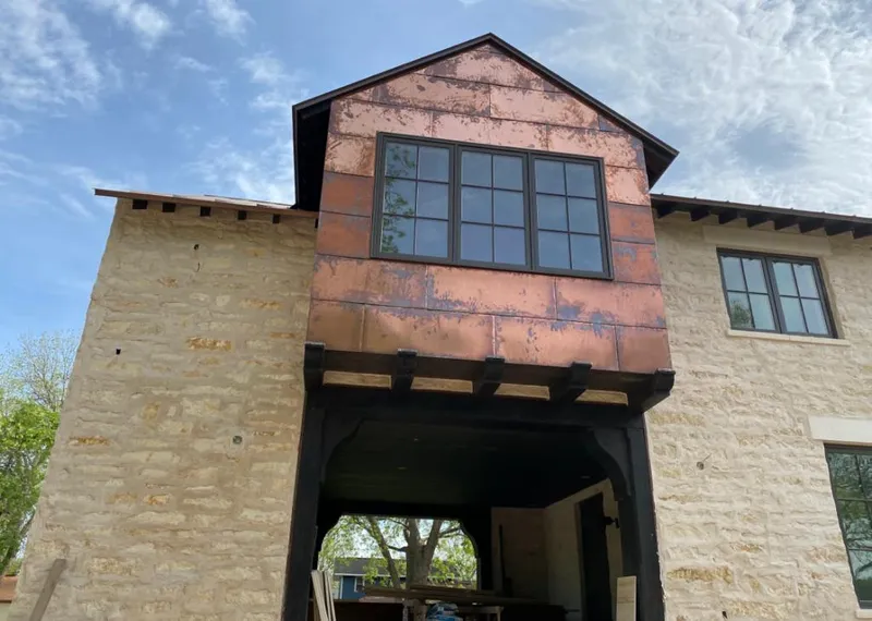 Copper metal panel facade on a stone building for Skylight Installation in Yuma